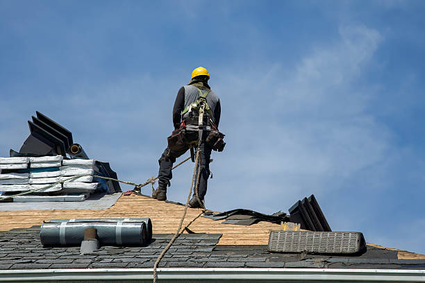 Professional Roof Replacement technician working in Cashion, OK